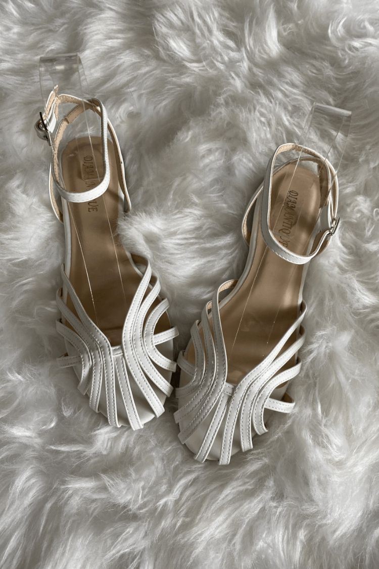 SOLE | Sandales plates tressées élégantes pour un look sophistiqué