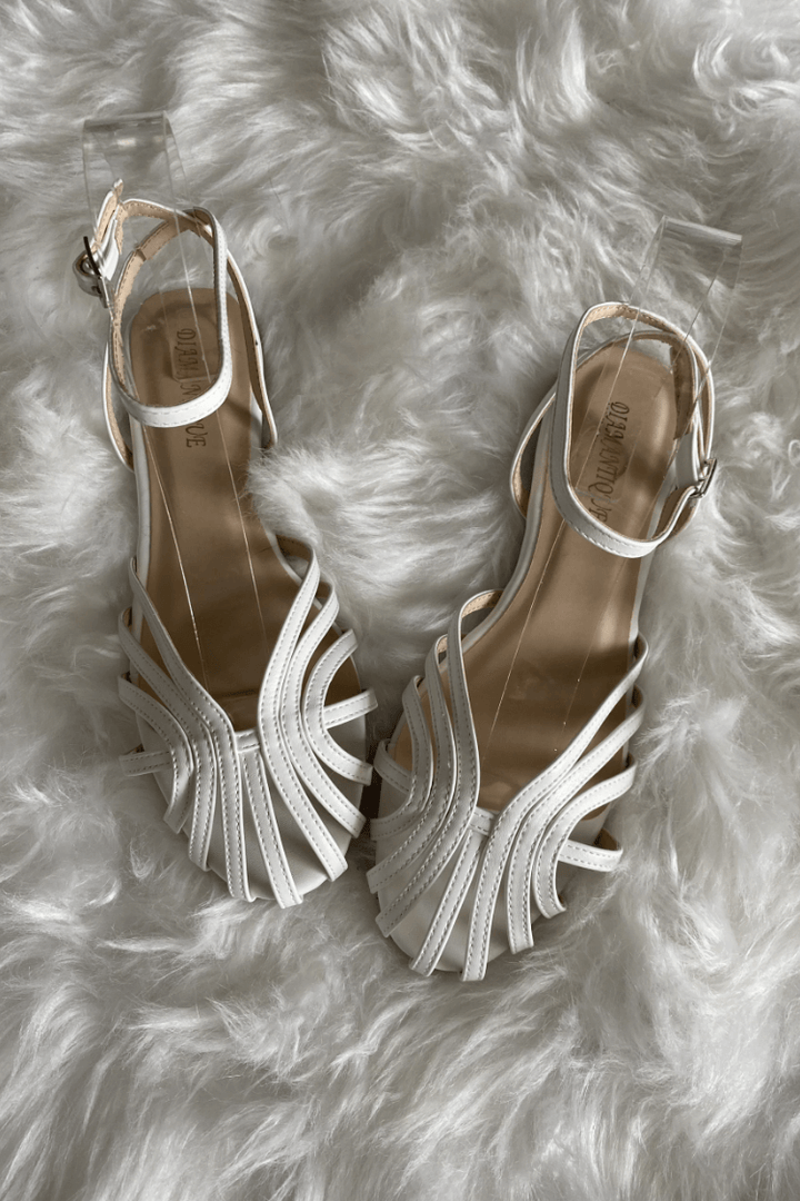 SOLE | Sandales plates tressées élégantes pour un look sophistiqué